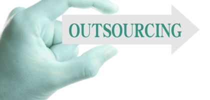 hand holding outsourcing sign